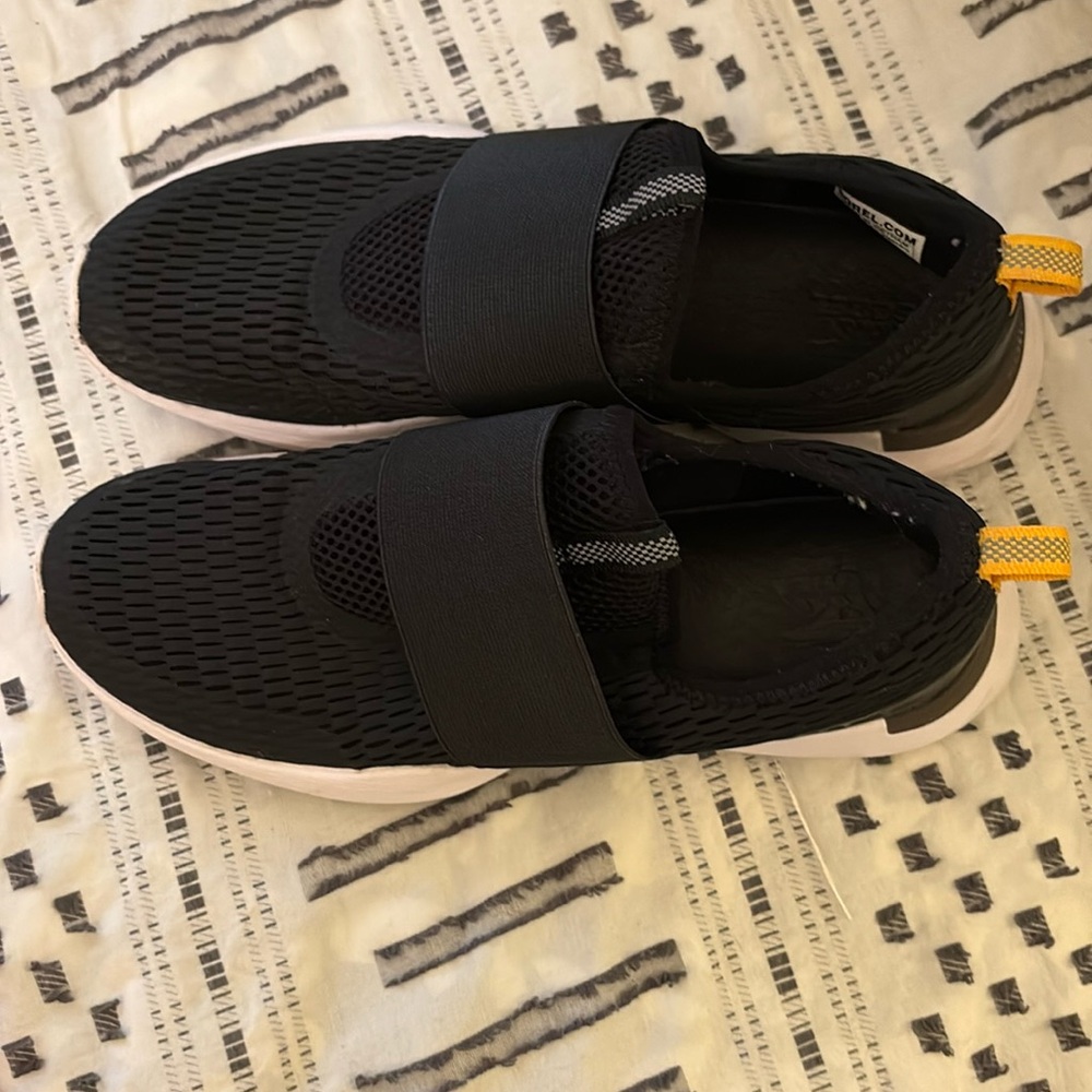 SOREL black Slip-On Sneakers with Yellow Accents women size 10